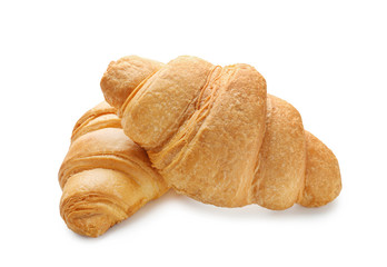 Tasty croissants on white background