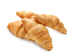 Tasty croissants on white background