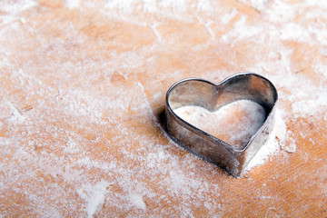 Preparing Christmas cookies. Cookies ingredients, copy space. Heart shape