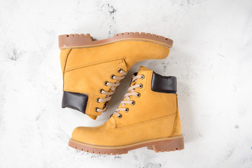 Women's winter boots. Yellow warm boots for trekking