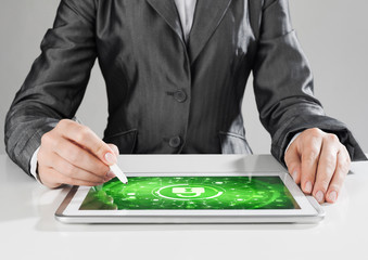 Internet security concept with woman working on media screen with stylus