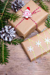 Christmas presents on wooden background, retro style with copy space