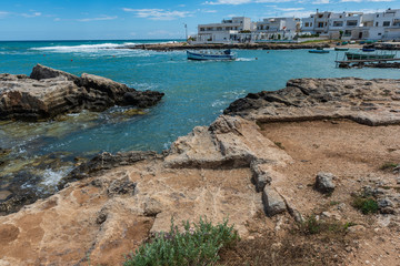 Obraz premium Enchanted sea. Boats in the bay of the abbey of San Vito