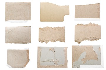 Fototapeta premium Set of brown paper torn on white background. rip of cardboard sheet used as a background. Different size brown rip paper. Make work path