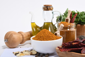 Picture of spices with vegetables bread and olive oil