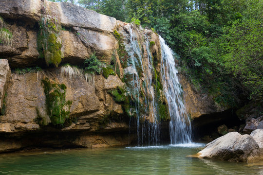 Waterfall in Catalonia surrounded by beautiful forests
