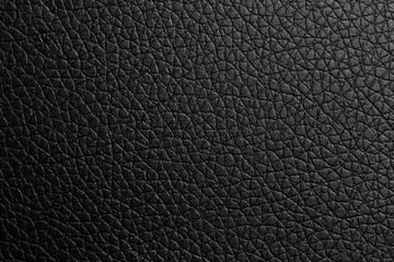 black paper texture or background with spotlight, dark tone 