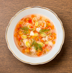 Onion soup with chopped onion rings in a soup plate