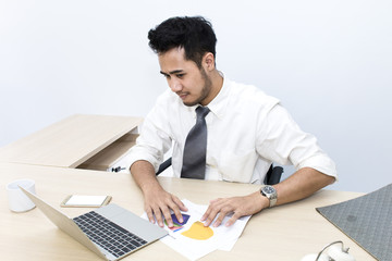 Young businessman  is 20-30 years old strain and worry at office.Man hands typing on computer keyboard .Copy space.