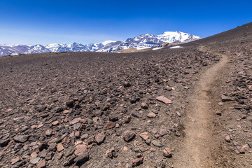 Andes valleys inside central Chile at Cajon del Maipo, Santiago de Chile, amazing views over mountains and glaciers a perfect place for hiking and having some adventure on a remote place