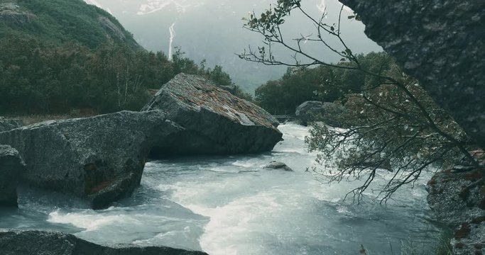 Brikdalsbreen River At Kleivafossen Waterfall, Norway