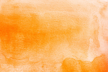 orange watercolor on paper painted background texture
