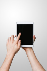 iPad mini tablet mockup hold by male hand