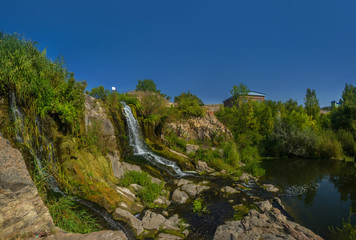 Fototapeta na wymiar Waterfall in Kryvyi Rih at Karachuni dam