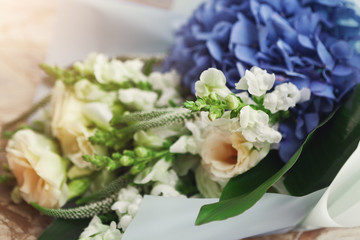 Obraz na płótnie Canvas Bouquet of fresh blue and white flowers