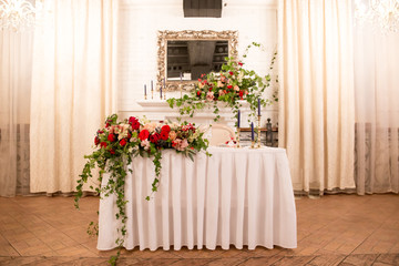 table decor for wedding ceremony, table setting, flowers, red and white decor. table for the...