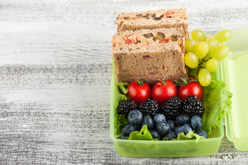 Vegetarian sandwich and berries