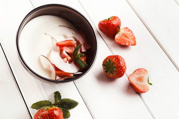 Coconut panna cotta with fresh strawberries