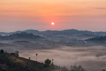 Beautiful sunrise and foggy mountain view at Doi Ang Khang,Chiang Mai,Thailand.
