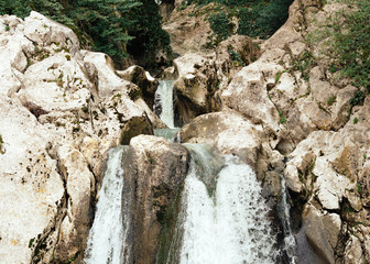 Waterfall in a mountain forest.  Background - 220117866