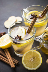 Autumn hot tea with ginger, lemon, honey and spices.