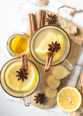 Hot Ginger tea with lemon, honey and spices.