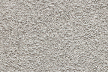 White wall with textured rough plaster