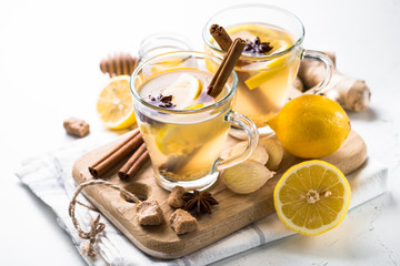Hot Ginger tea with lemon, honey and spices.