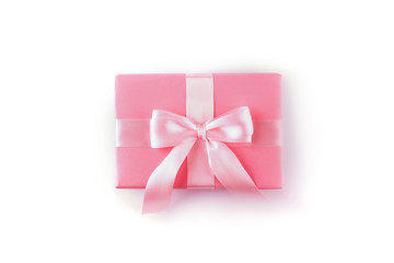 Gift or present box on whitetable top view.