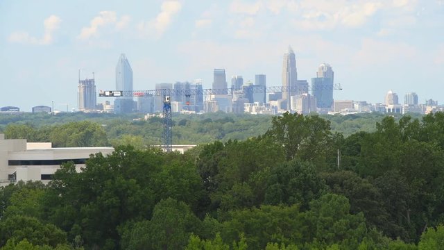 Zoom into downtown Charlotte, North Carolina on a summer day