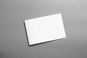 Blank portrait mock-up paper. brochure magazine isolated on gray, changeable background / white paper isolated on gray