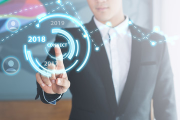 businessman pressing a 2018 year start button happy success celebration. New year a future part