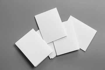 Blank portrait mock-up paper. brochure magazine isolated on gray, changeable background / white paper isolated on gray