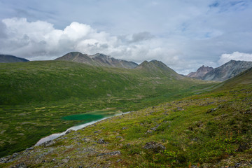 Green lake in old glacier near Denali