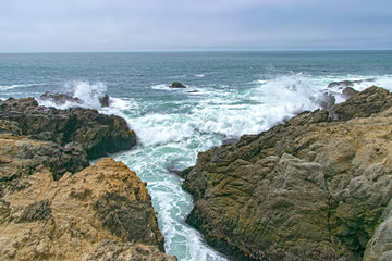 Waves crashing in high surf on the N. California coast