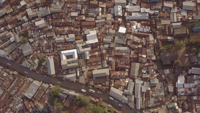 Remarkable aerial shot looking straight down above vast overpopulated slums in Kibera, Nairobi, Kenya, Africa.