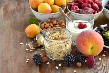 Cereals, almonds and various berries for breakfast, healthy nutrition, copy space