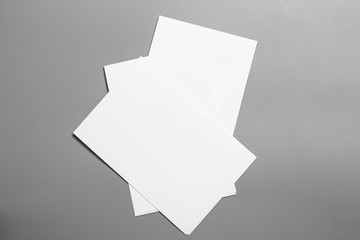 Blank portrait mock-up paper. brochure magazine isolated on gray, changeable background / white paper isolated on gray