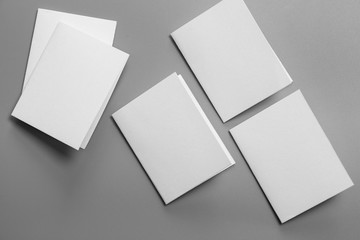 Blank portrait mock-up paper. brochure magazine isolated on gray, changeable background / white paper isolated on gray