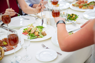 Party dinner table, celebrating with friends of family served at home or in a restaurant.