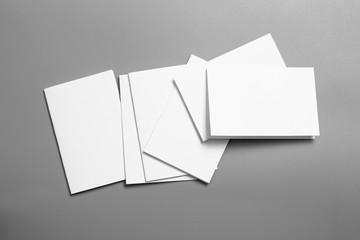 Blank portrait mock-up paper. brochure magazine isolated on gray, changeable background / white paper isolated on gray