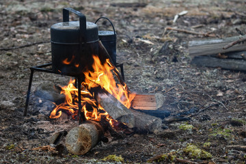 A rest on the nature. A bonfire, a bowler. Cooked at the stake