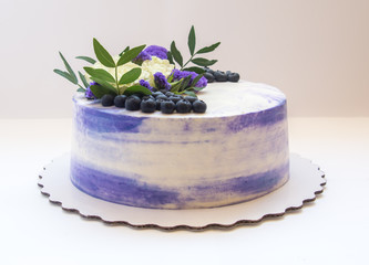 Biscuit cake with blueberry and flowers