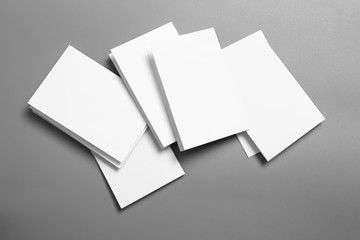 Blank portrait mock-up paper. brochure magazine isolated on gray, changeable background / white paper isolated on gray