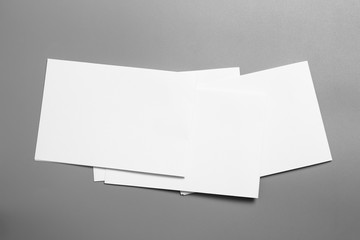 Blank portrait mock-up paper. brochure magazine isolated on gray, changeable background / white paper isolated on gray