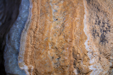 View of stalactites and stalagmites in an underground cavern - Postojna cave in Slovenia