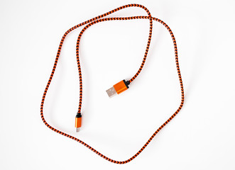 orange usb cable on a white background