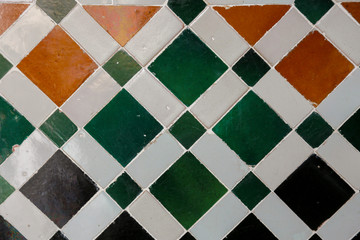 multi-colored ceramic wall with backdrop wallpaper