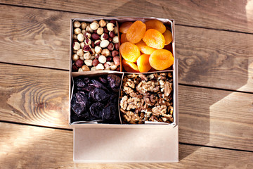 A box of nuts and dried fruits.