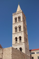 Fototapeta na wymiar Croatia, Zadar - the historic tower of the belfry of the Cathedral of St. Anastasia built between the 15th and 19th centuries.